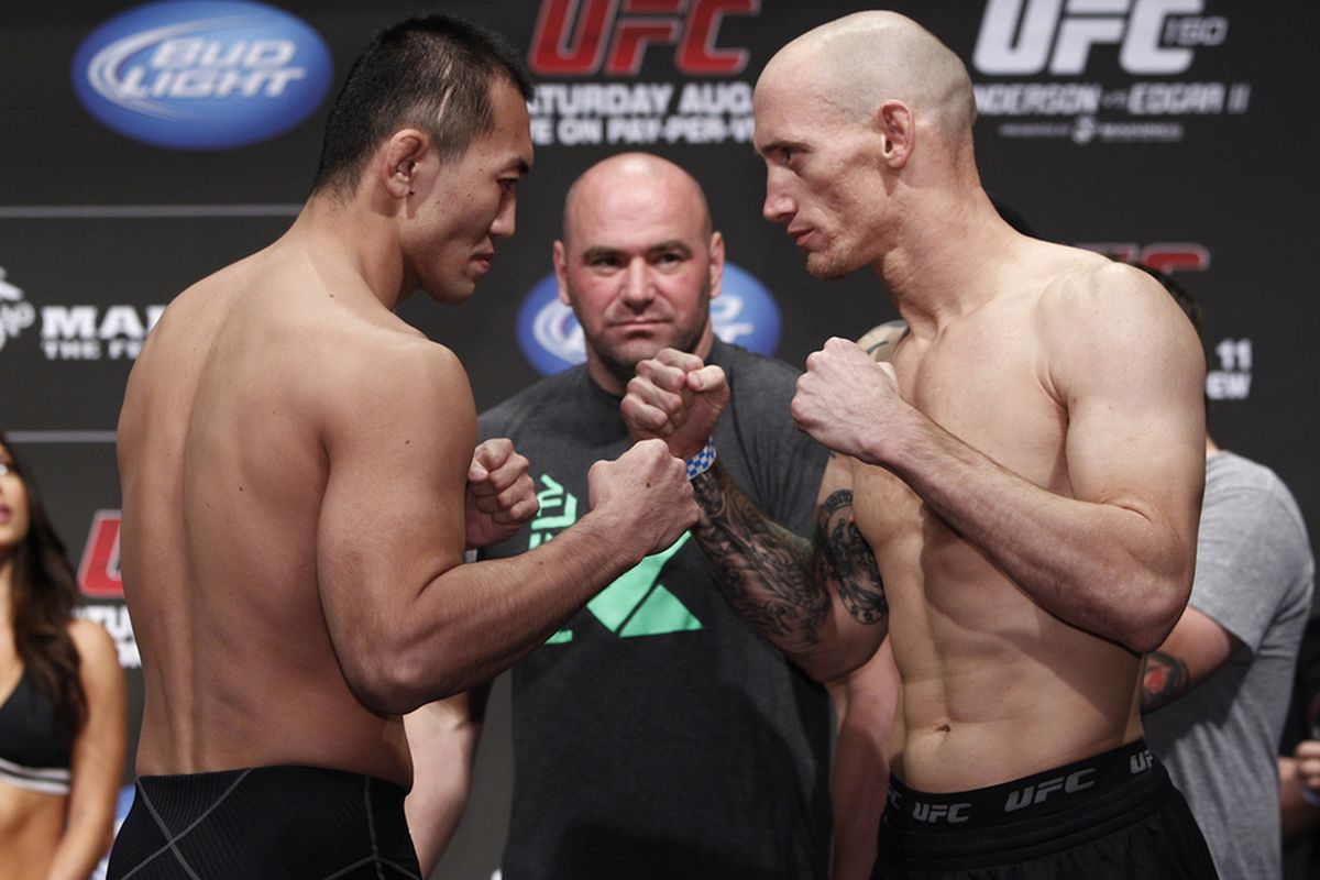 Yushin Okami and Buddy Roberts square off during the UFC 150 weigh-ins at the Pepsi Center in Denver on Friday, Aug. 10, 2012. Photo by Esther Lin/MMA Fighting. 