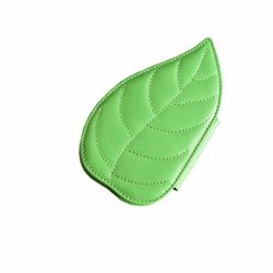 Welcome Companions <a href="http://www.ofakind.com/editions/1909-JUNGLE-LEAF-CARD-HOLDER">Jungle Leaf Card Holder</a> $27 (down from $98)