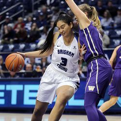 Brigham Young Cougars forward Shalae Salmon (3) is guarded by Washington Huskies forward/center Katie Collier (13) during NCAA basketball In Provo on Thursday, Dec. 22, 2016.