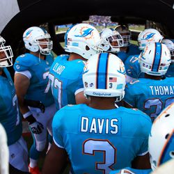 Aug 4, 2013; Canton, OH, USA; Miami Dolphins prior to taking the field to start the 2013 Pro Football Hall of Fame game at Fawcett Stadium.