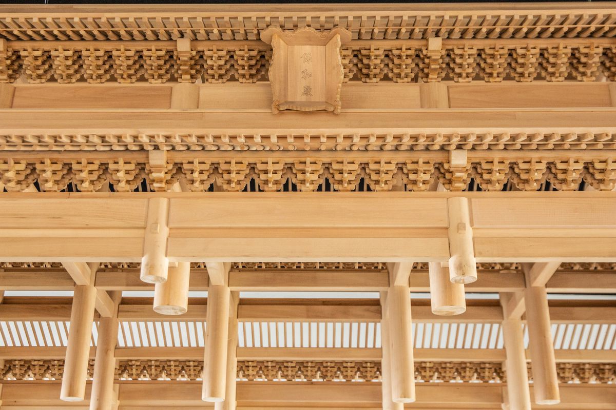 Details of the baohe dian, a hand-carved replica roof of the Hall of Preserving Harmony in the Forbidden City at Mala Town