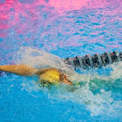 Desert Hills’ Caitlin Romprey swims her way to a win in heat 2 of the 100 yard backstroke in the 4A women’s swimming state meet at the South Davis Recreation Center in Bountiful on Saturday, Feb. 13, 2021.