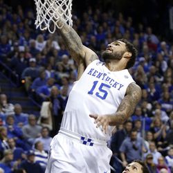 Kentucky's Willie Cauley-Stein (15) dunks past South Carolina's Michael Carrera during the first half of an NCAA college basketball game, Saturday, Feb. 14, 2015, in Lexington, Ky. 