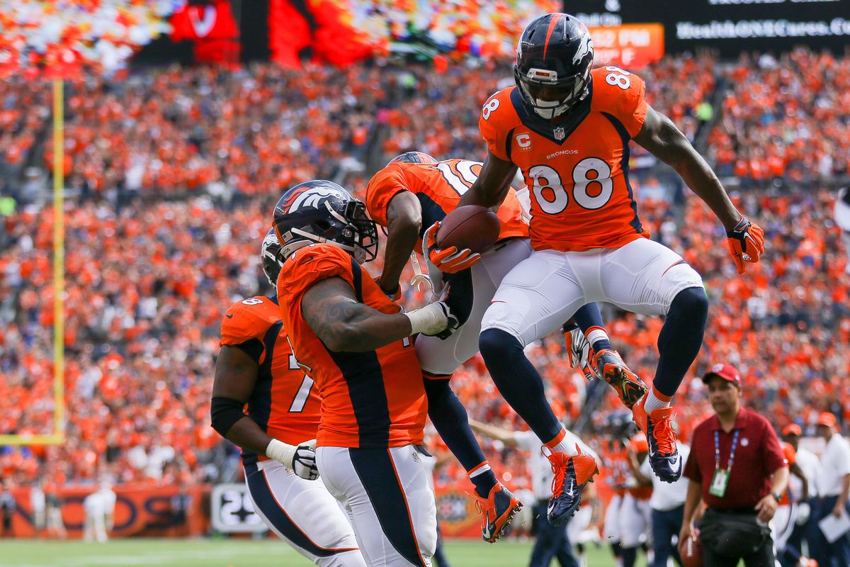 Demaryius Thomas celebrates with teammates after his second-quarter touchdown reception.