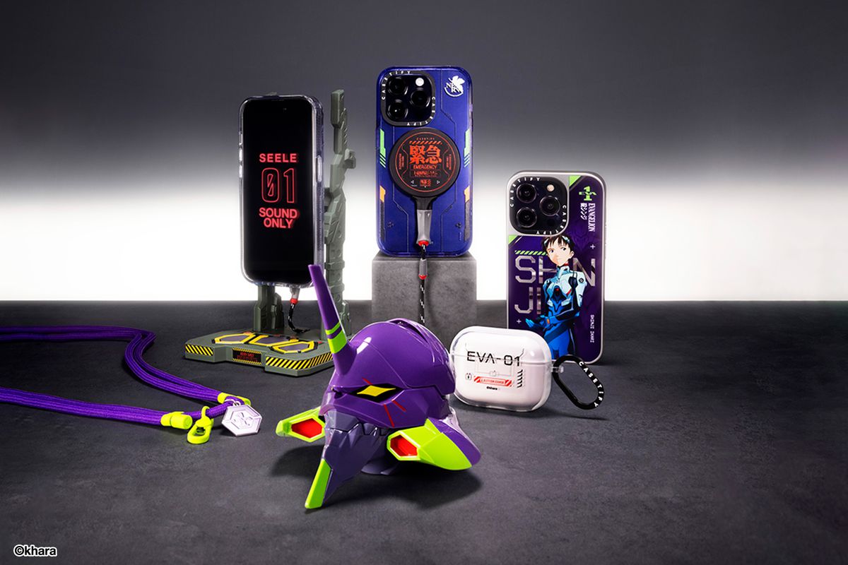 Smartphones in various cases, including one modeled after the Eva-01 unit and Shinji Ikari from Neon Genesis Evangelion