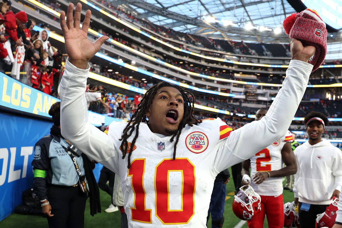 Isiah Pacheco #10 of the Kansas City Chiefs celebrates as he leaves the field after a game against the Los Angeles Chargers at SoFi Stadium on January 07, 2024 in Inglewood, California.