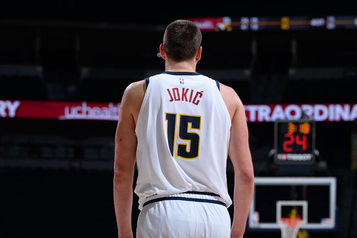 Nikola Jokic of the Denver Nuggets looks on during a preseason game against the Portland Trail Blazers on December 16, 2020 at the Pepsi Center in Denver, Colorado.&nbsp;