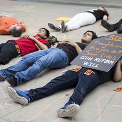 Students stage a die-in in front of Trump Tower to protest gun violence. | Ashlee Rezin/Sun-Times