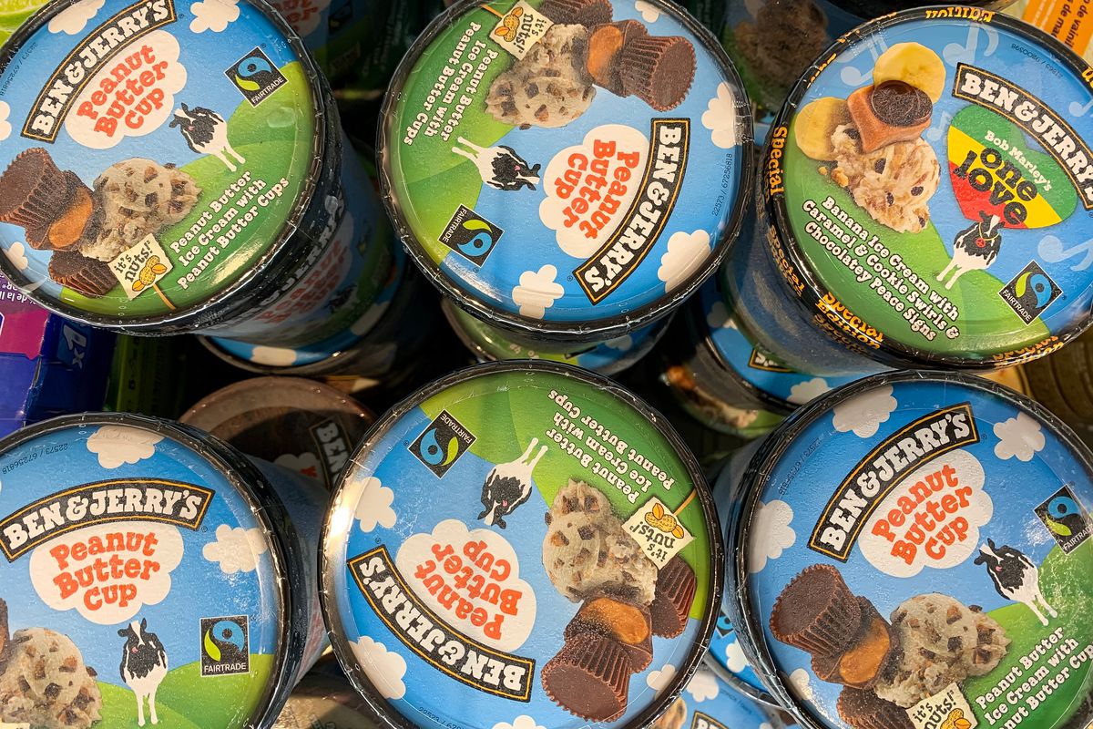 Cartons of Ben &amp; Jerry’s in a grocery store freezer