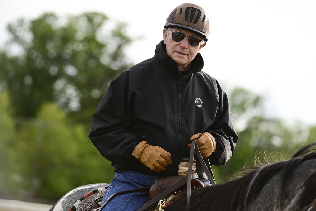 Hall of fame trainer D. Wayne Lukas rides during morning work out at Pimlico Race Course.