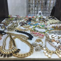 Embellished necklaces, $60