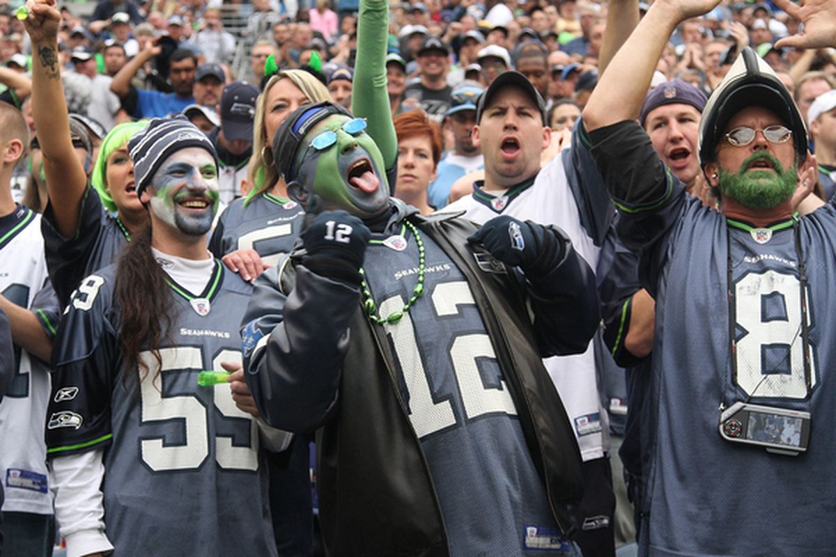 SEATTLE - SEPTEMBER 26:  Fans of the Seattle Seahawks cheer during the game against the San Diego Chargers at Qwest Field on September 26 2010 in Seattle Washington. The Seahawks defeated the Chargers 27-20. (Photo by Otto Greule Jr/Getty Images)
