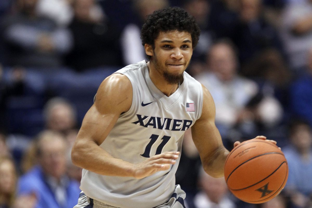 There were bumps and bruises involved, but Dee Davis led Xavier to a vital win.