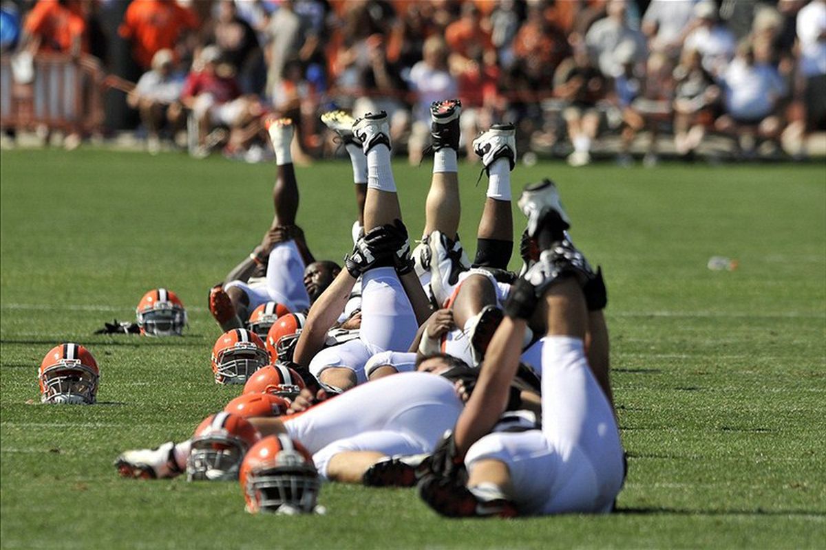Players stretch during Cleveland Browns training camp at the Cleveland Browns training facility. Mandatory Credit: David Richard-US PRESSWIRE