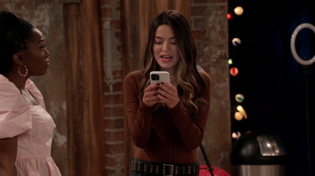 carly looking at something on her phone