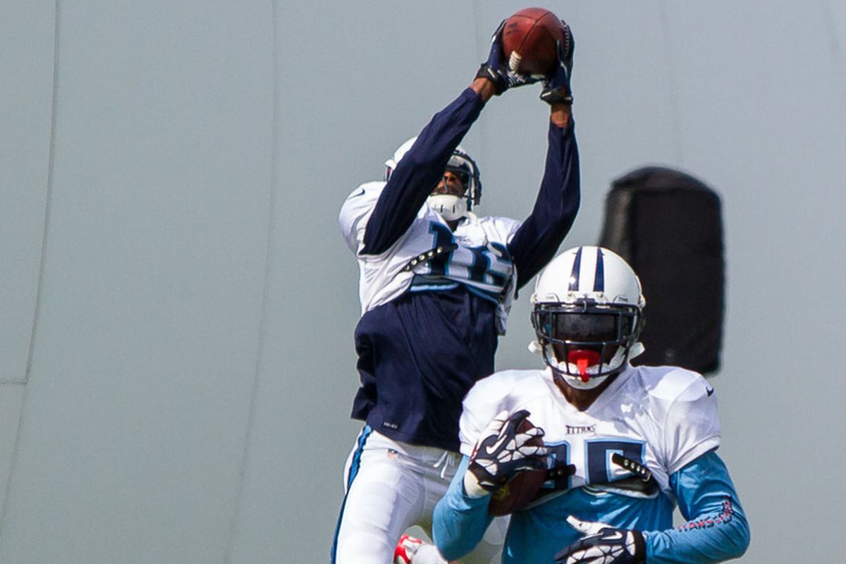 Justin Hunter leaps for a catch during training camp