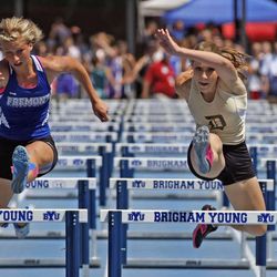 Tawnie Moore, left, takes second at the Utah State High School Track Championships Saturday, May 19, 2012, in Provo Utah.