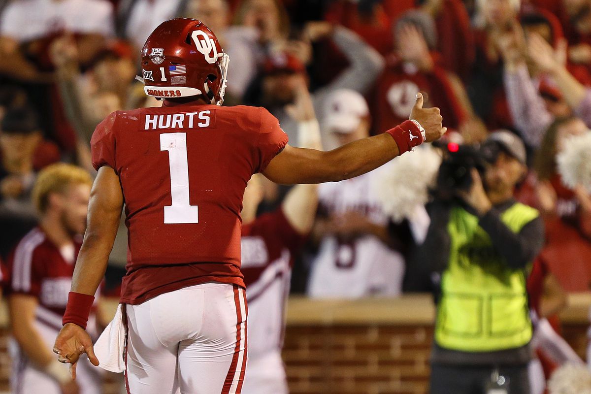 Quarterback Jalen Hurts #1 of the Oklahoma Sooners celebrates his touchdown against the Iowa State Cyclones in the second quarter on November 9, 2019 at Gaylord Family Oklahoma Memorial Stadium in Norman, Oklahoma. OU held on to win 42-41.