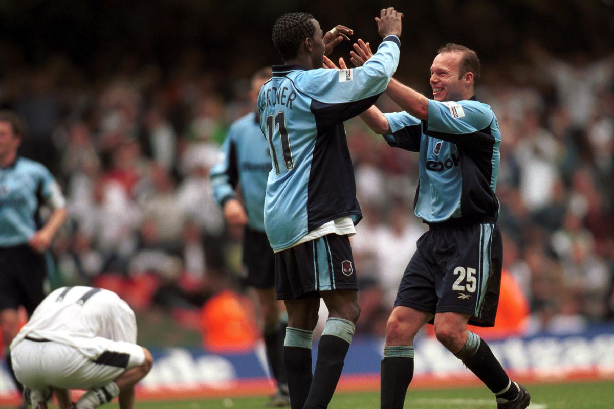 Gardner celebrates with Simon Charlton after scoring in the 3-0 win against Preston in the Play-Off final in 2001.