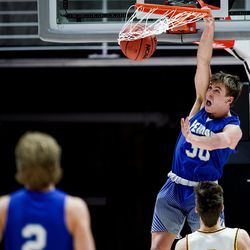 Fremont’s Dallin Hall dunks during the 6A boys basketball championship game against Davis at the Huntsman Center in Salt Lake City on Saturday, Feb. 29, 2020.