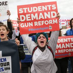 Students lead the "March for Our Lives" rally in Salt Lake City on Saturday, March 24, 2018. Thousands of protesters marched from West High School to the state Capitol to advocate for stricter gun control laws.
