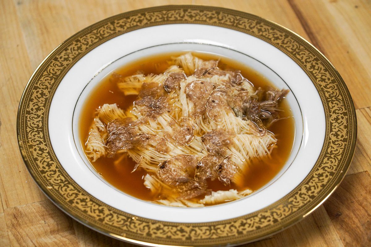 A specialty Italian pasta with white truffles in broth.