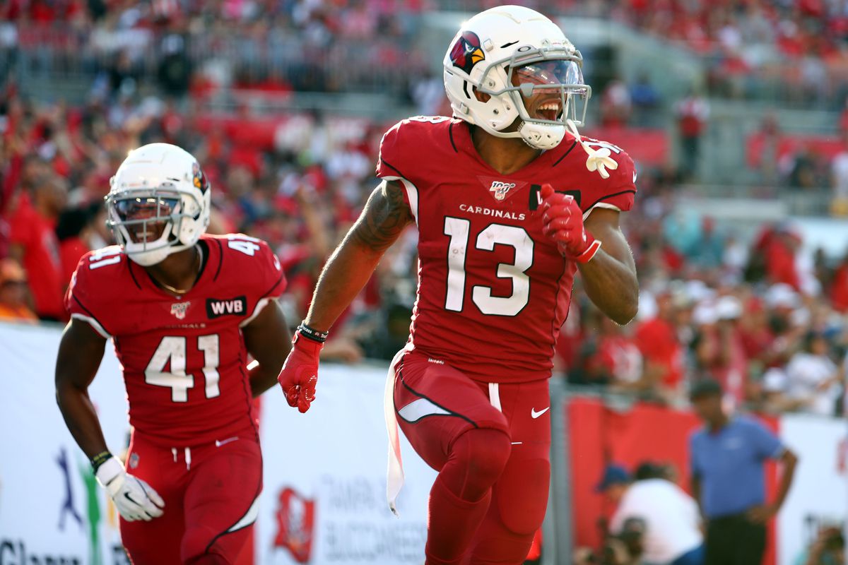Arizona Cardinals wide receiver Christian Kirk is congratulated by running back Kenyan Drake as he scores a touchdown against the Tampa Bay Buccaneers during the second half at Raymond James Stadium.