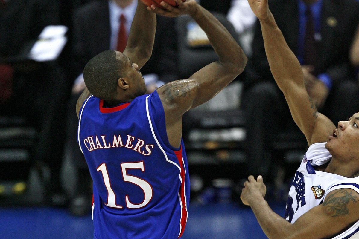 Kansas’ Mario Chalmers puts up a game-tying three point shot against Memphis to send the game into overtime during the NCAA Men’s Basketball Championship game at the Alamodome in San Antonio, Texas, Monday, April 7, 2008. Kansas defeated Memphis, 75-68.