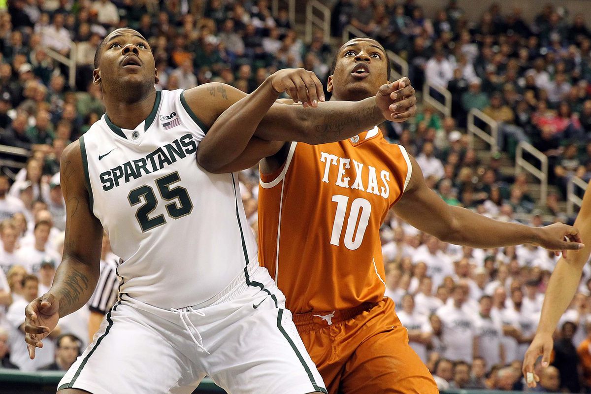 Jonathan Holmes and the Texas Longhorns held their own on the boards with the physical Michigan State Spartans.