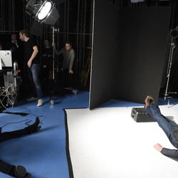 In this Jan. 20, 2015 photo released by NBC, country music singer and TV personality Blake Shelton, right, poses for promotional photos for "Saturday Night Live," with photographer Mary Ellen Matthews in New York.  Shelton, a guest host this week, posed for a portfolio of images used as "bumper IDs" before and after each commercial break. 