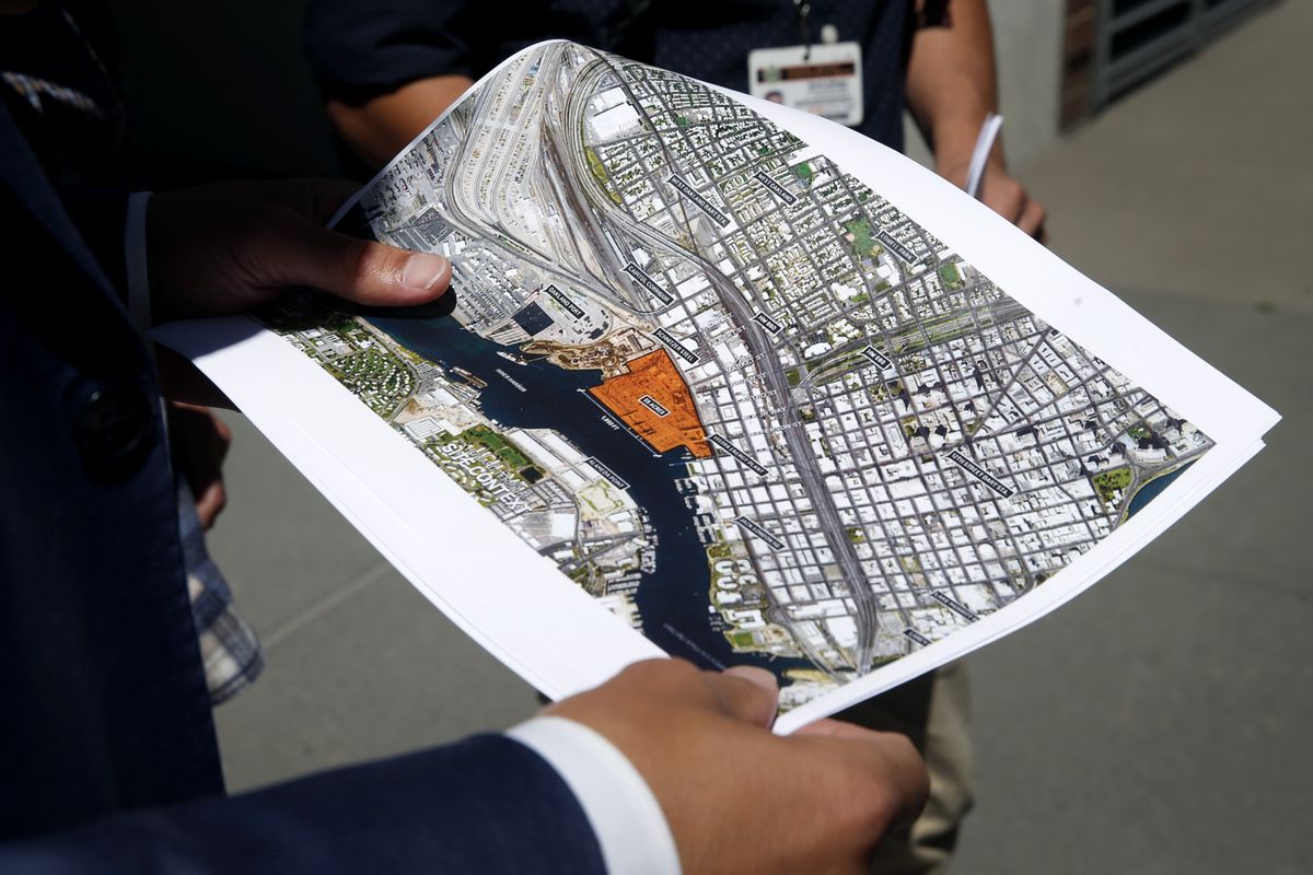 Oakland A’s President Dave Kaval displays a map of the Howard Terminal site and surrounding area in Oakland, Calif. on Tuesday, Sept. 3, 2019 where the baseball team is hoping to build its new stadium.