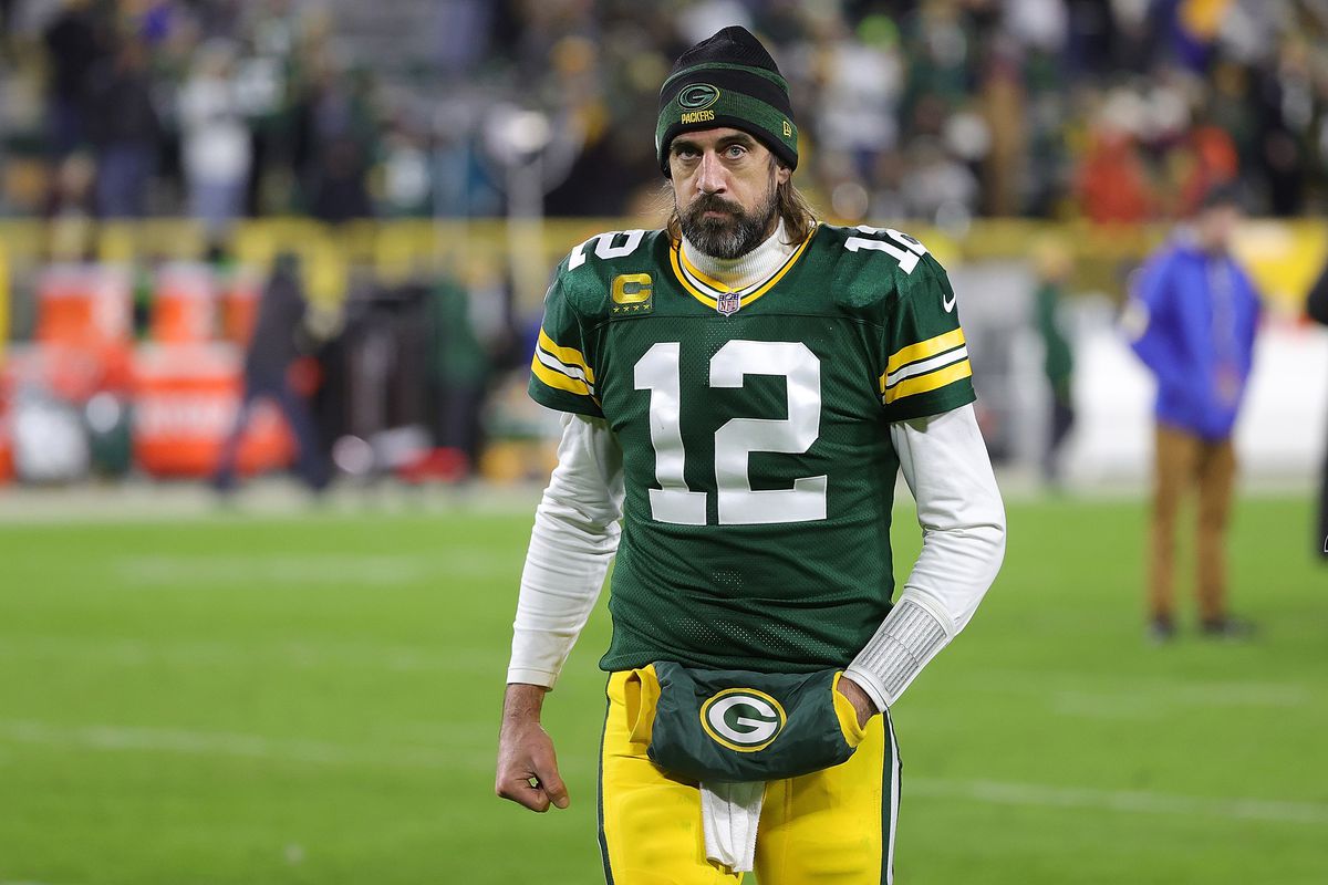 Aaron Rodgers #12 of the Green Bay Packers leaves the field following a game against the Los Angeles Rams at Lambeau Field on November 28, 2021 in Green Bay, Wisconsin. The Packers defeated the Rams 36-28.