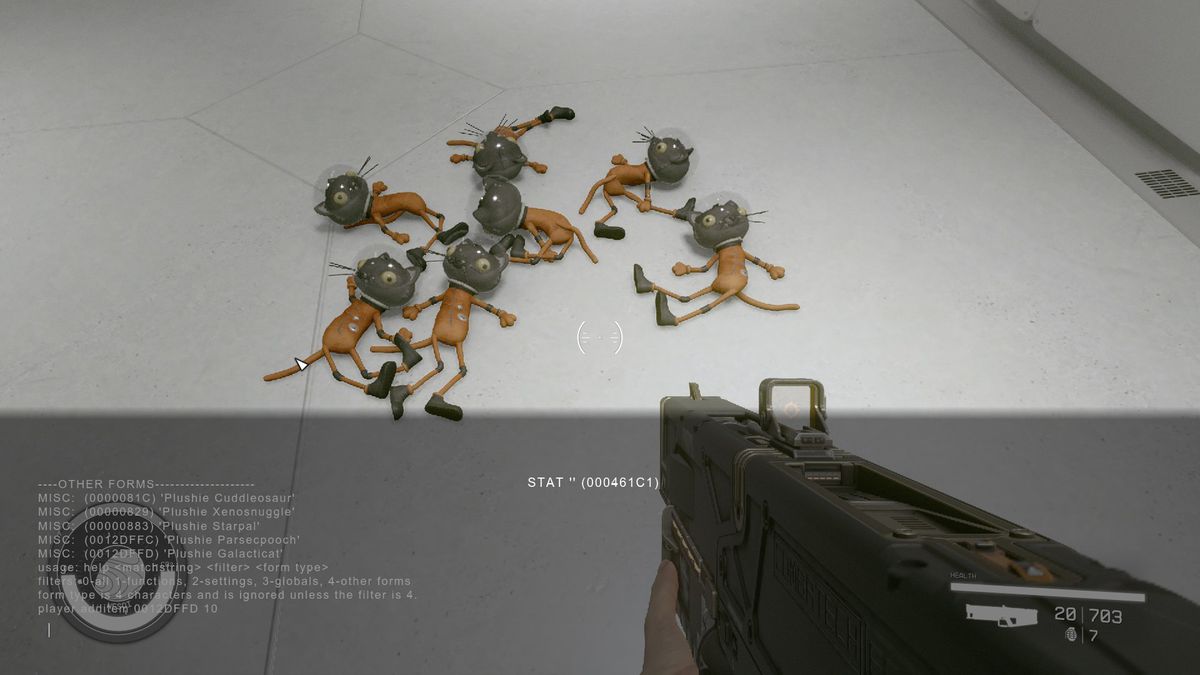 A pile of cheated in cat plushies in Starfield on the ground with the console command up, noting the code for several other plushies