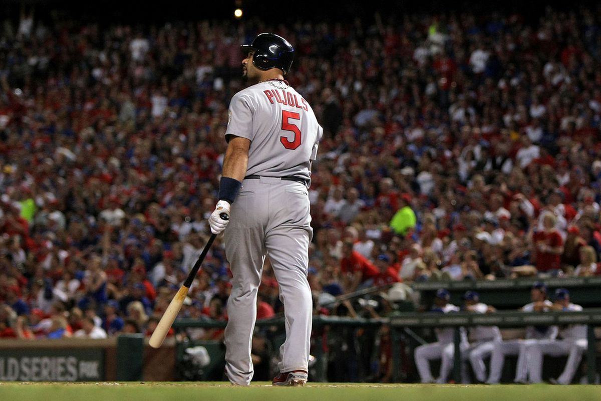 Here's Albert Pujols staring at the ball as his third home run sails out of the park. That home run was worth +.001 WPA.