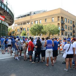 4:54 p.m. Lineup outside the main bleacher gate, just minutes before the gates open - 