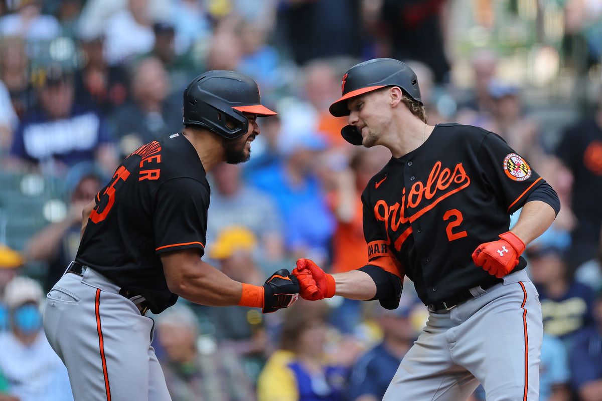Gunnar Henderson of the Baltimore Orioles celebrates a two run home run with Anthony Santander during the eighth inning against the Milwaukee Brewers at American Family Field on June 08, 2023 in Milwaukee, Wisconsin.  