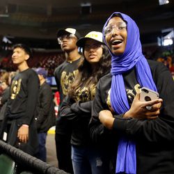 Mina Abdullahi joins with her teammates as they watch their robot in action as they compete in the First Robotics Competition Utah Regional event at the Maverik Center in West Valley City, Utah, on Friday, March 29, 2019. First — For Inspiration and Recognition of Science and Technology — was created "to inspire young people's interest and participation in science and technology."