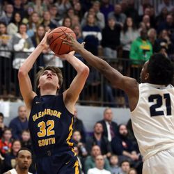 Glenbrook South’s Dom Martinelli (32) shoots over Evanston’s Jalen Christian during their 68-60 loss in Skokie Tuesday, March 5, 2019. | Kevin Tanaka/For the Sun Times