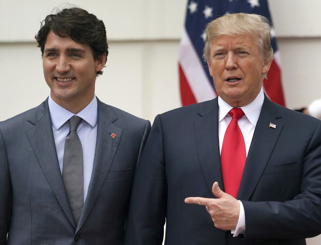 President Donald Trump and Canadian Prime Minister Justin Trudeau pose for a photo as Trudeau arrives at the White House on Oct. 11, 2017. | AP file photo