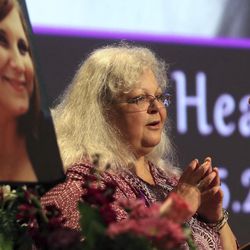 Susan Bro, mother to Heather Heyer, speaks during a memorial for her daughter, Wednesday, Aug. 16, 2017, at the Paramount Theater in Charlottesville, Va.  Heyer was killed Saturday, when a car rammed into a crowd of people protesting a white nationalist rally.  