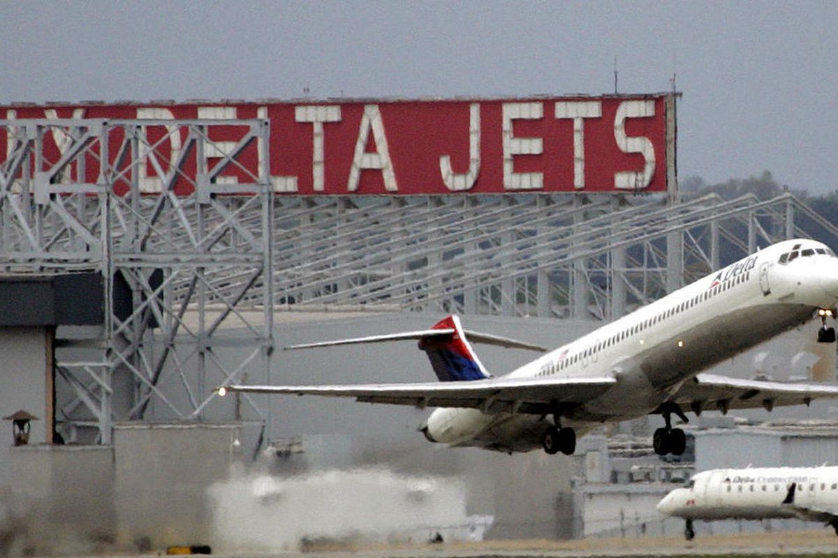 In this April 14, 2008 file photo, a Delta Airlines jet departs Hartsfield Jackson Atlanta International Airport in Atlanta. 