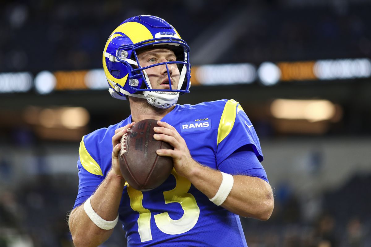 John Wolford #13 of the Los Angeles Rams warms up prior to an NFL football game against the Las Vegas Raiders at SoFi Stadium on December 8, 2022 in Inglewood, California.