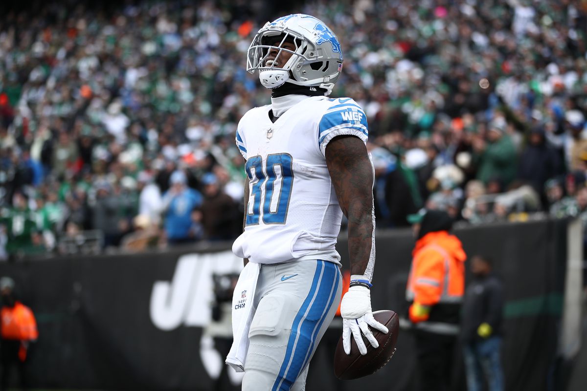 Jamaal Williams #30 of the Detroit Lions celebrates a run that was called back by a penalty during the first half against the New York Jets at MetLife Stadium on December 18, 2022 in East Rutherford, New Jersey.