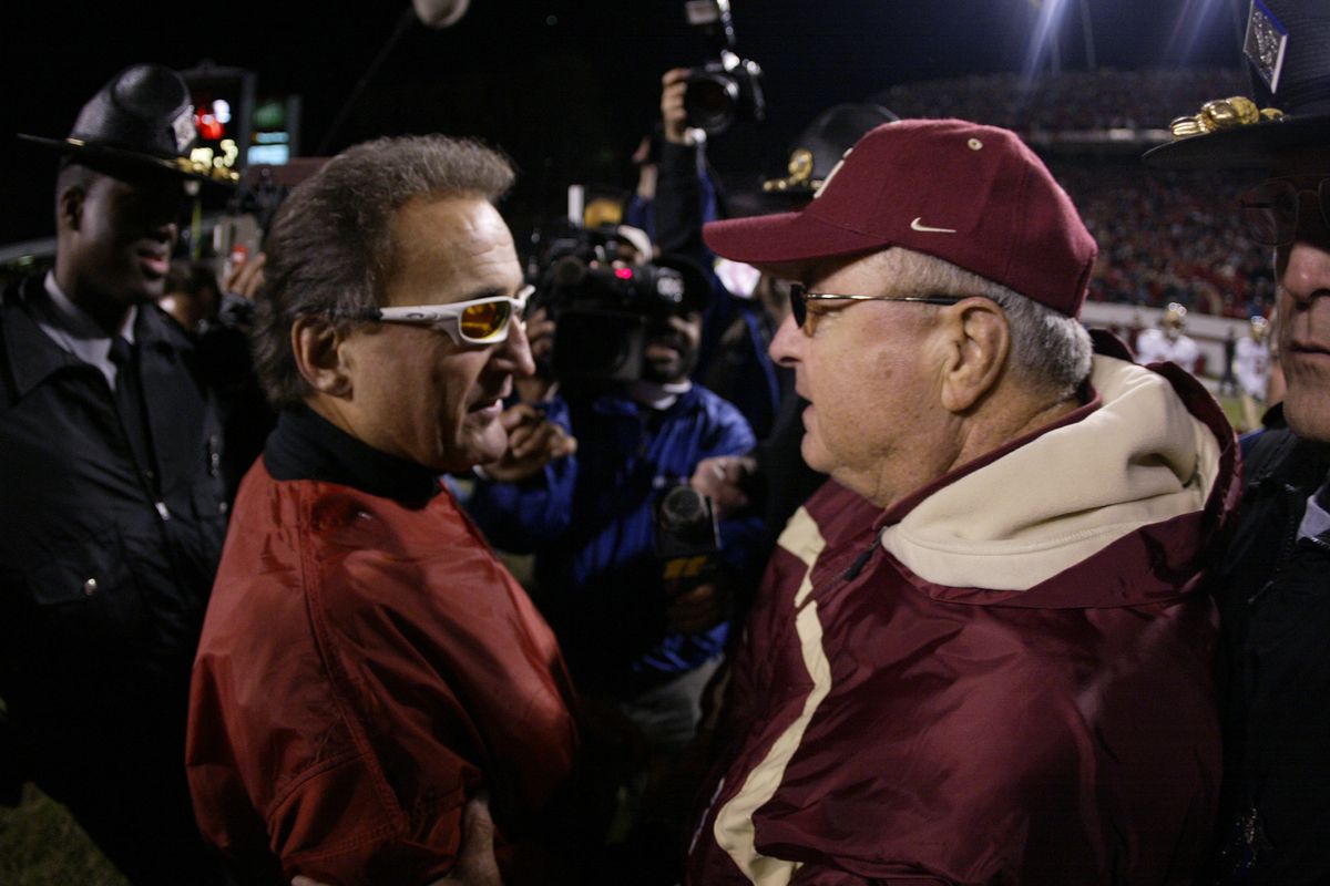 Coach Amato and coach Bowden greet each other