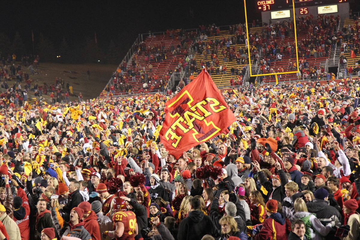 AMES, IA - NOVEMBER 18:  Iowa State Cyclones fans rush the field after an upset win against the Oklahoma State Cowboys at Jack Trice Stadium November 18, 2011 in Ames, Iowa.  (Photo by Reese Strickland/Getty Images)