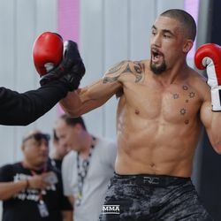 Robert Whittaker shows off his striking at UFC 234 workouts.