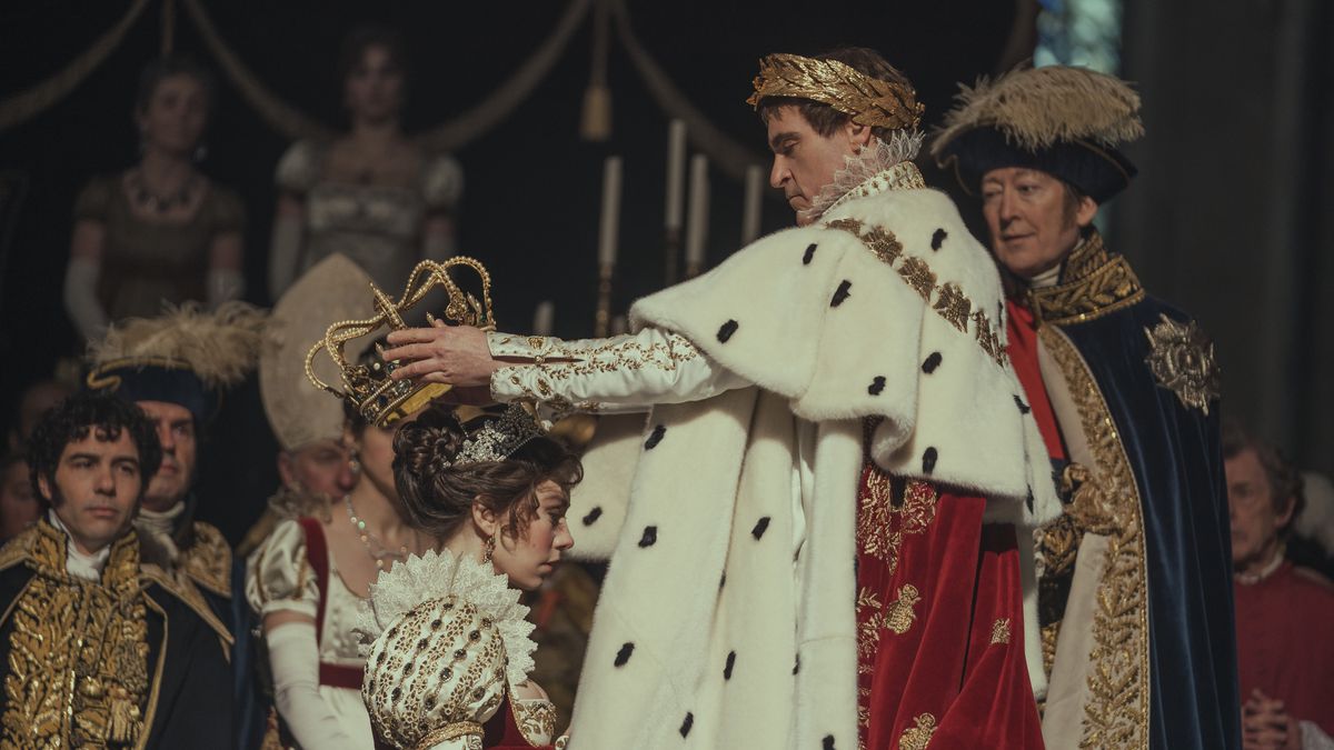Napoleon’s coronation, in which the newly-crowned Emperor of France stands in his regalia and places a crown on his wife Josephine in the film Napoleon 
