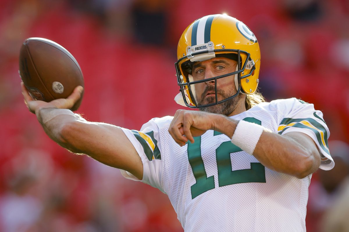 Aaron Rodgers #12 of the Green Bay Packers participates in pregame warmups prior to the preseason game against the Kansas City Chiefs at Arrowhead Stadium on August 25, 2022 in Kansas City, Missouri.