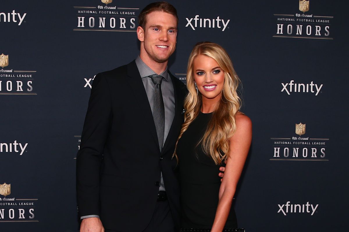 Ryan Tannehill, shown with wife Lauren, is the top sleeper at quarterback.