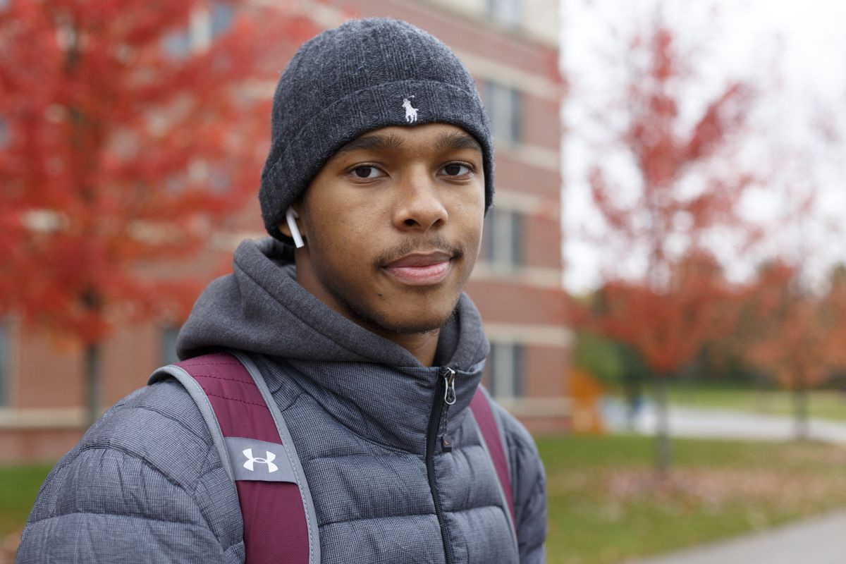 Central Michigan University freshman, Demetrius Robinson Jr., poses for a photograph outside his dorm on Wednesday, Oct. 30, 2019 at the CMU campus in Mt. Pleasant, Mich.